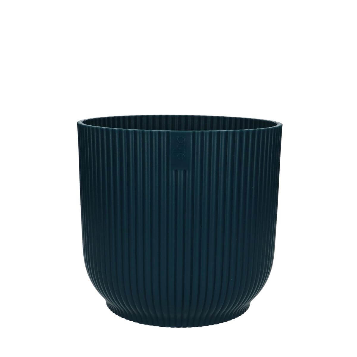 Vibes pot in soft blue hue with unique ribbed texture, perfect for displaying vibrant foliage.